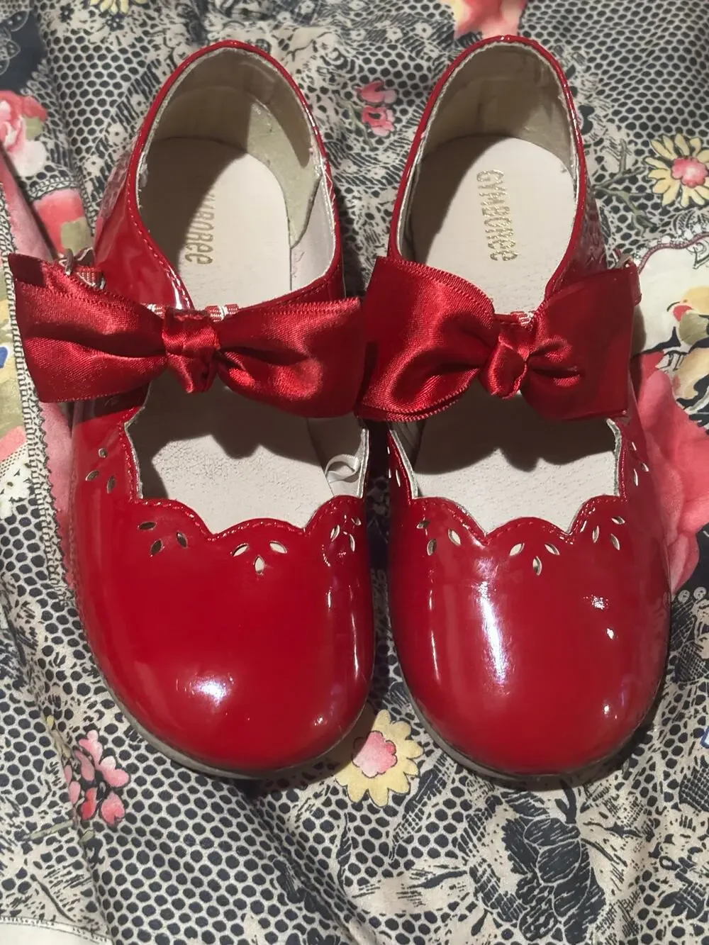 Gymboree 1 red patent like Mary Jane’s red satin bow still life left super cute
